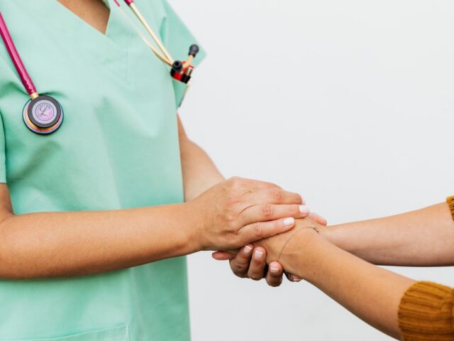 Close up of hands, symbolising trust and empathy in care